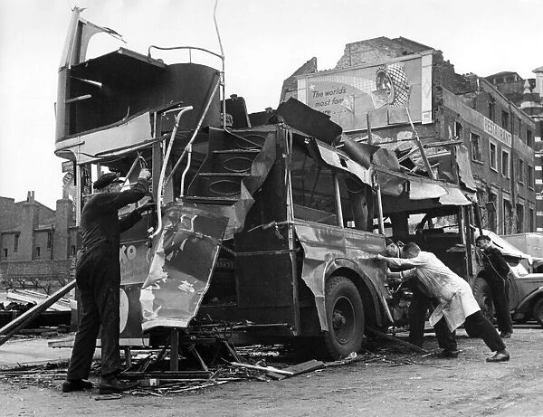 Bomb damage near Waterloo Station. A Blitzed bus caused by blast from a V1 flying bomb