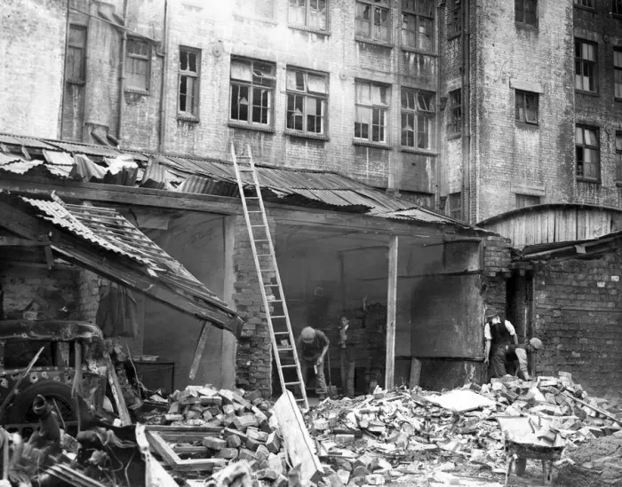 Framed Print : Bomb damage to back premises on the outskirts of a South Wales town