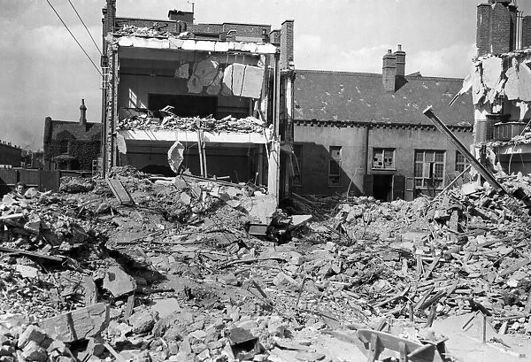 Bomb damage to a school following an air raid attack. Circa 1940