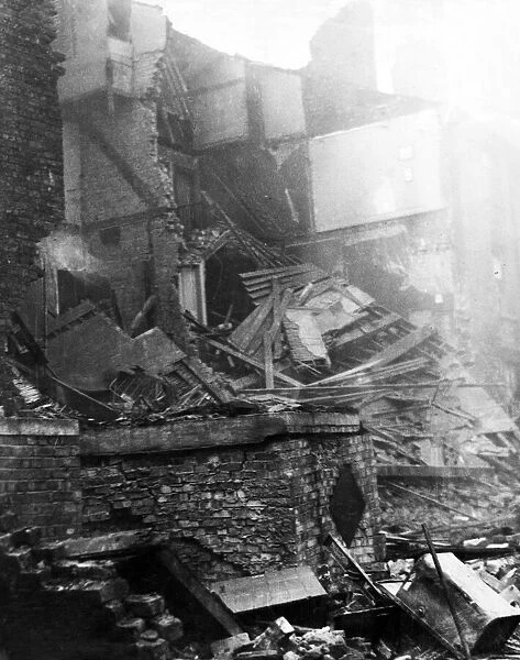 Bomb damage in Upper Canning Street, Liverpool. The shelters shown in the foreground were