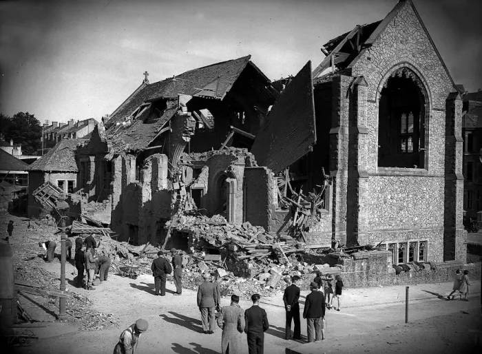 Framed Print : Bomb damaged Plymouth during WW2, People survey the damage left after an air raid Framed Print : Bomb damaged Plymouth during WW2, People survey the damage left after an air raid