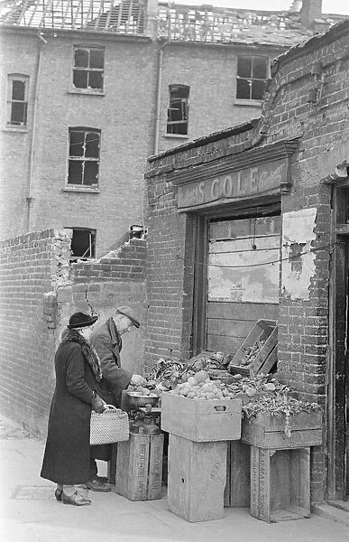 Bombed out Greengrocers store, 26th April 1941