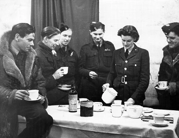 Bomber crews enjoying tea after a night raid on Germany. Circa September 1941