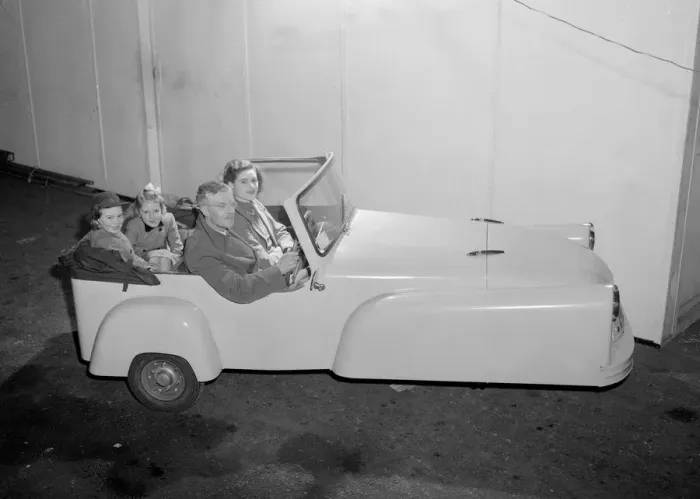 Framed Print : Bond Minicar. A three wheeled small open top car. The driver of this car is Lt, Col, M. G
