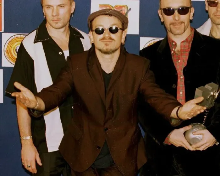 Framed Print : Bono, lead singer of Irish rock group U2, looks bemused after his band received the Best Framed Print : Bono, lead singer of Irish rock group U2, looks bemused after his band received the Best