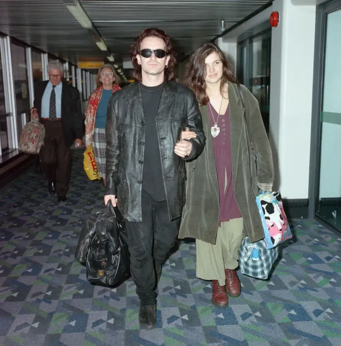 Framed Print : Bono of rock group U2 and his wife Ali pictured at London Airport. 10th October 1991 Framed Print : Bono of rock group U2 and his wife Ali pictured at London Airport. 10th October 1991