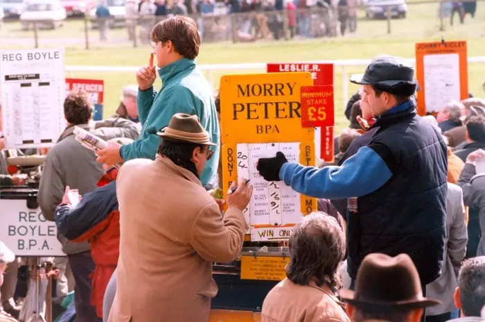 Framed Print : A bookie changing the odds at the racetrack in April 1995 Framed Print : A bookie changing the odds at the racetrack in April 1995