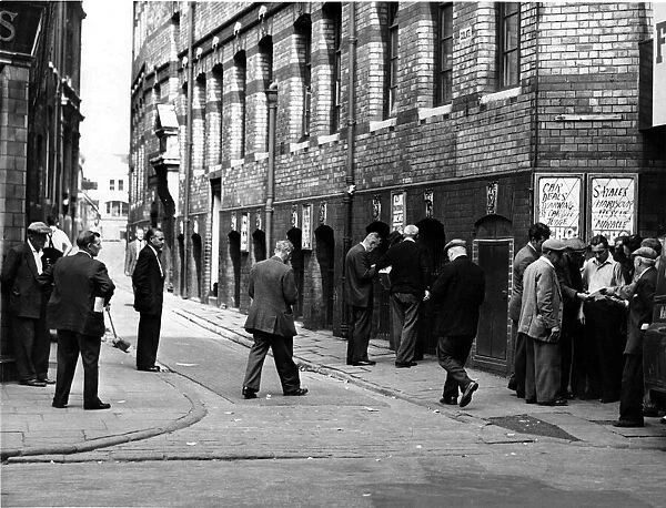 Bookmakers pictured around the Golate near the Queens Vaults Pub, Cardiff
