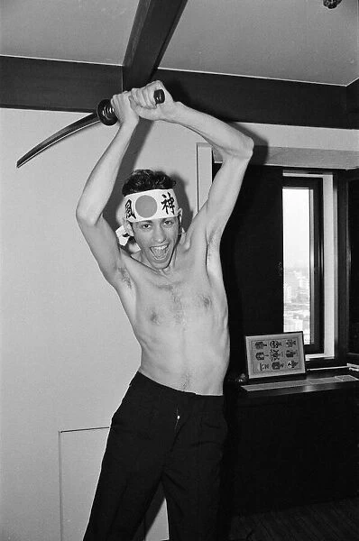 The Boomtown Rats in Tokyo. Pictured, singer Bob Geldof with a sword. May 1980