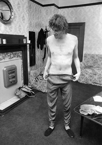 'Boomtown Rats'on Tour Bob Geldof changing after show. October 1979 P003855