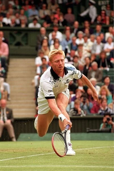 BORIS BECKER IN ACTION PLAYING ON COURT AT THE 1993 WIMBLEDON TENNIS TOURNAMENT