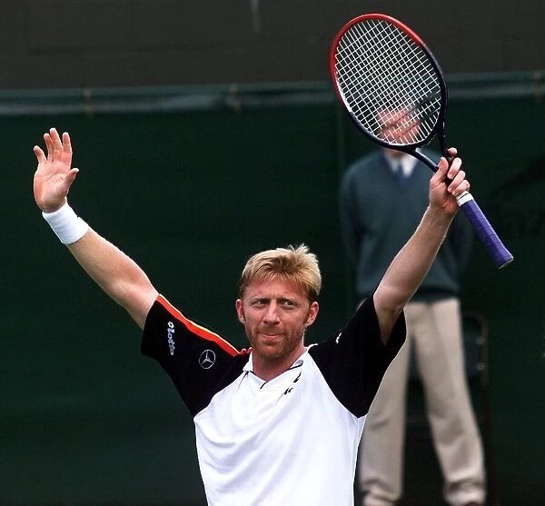 Boris Becker celebrates his victory over Miles Maclagan in his first round mens singles