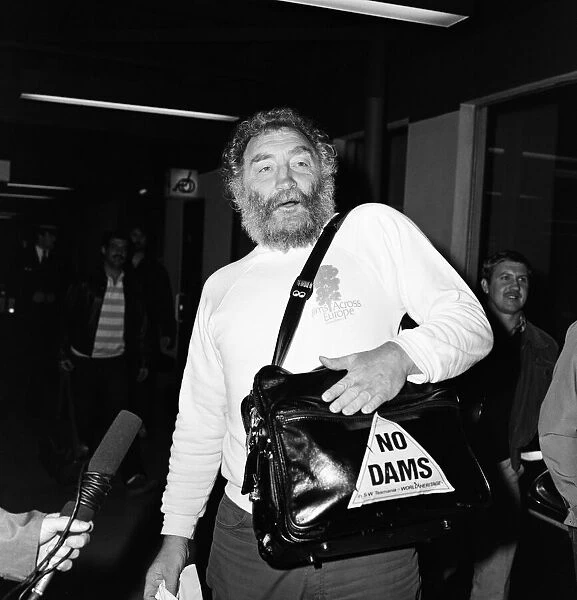 Botanist David Bellamy arriving at Heathrow from Tasmania where he has been protesting