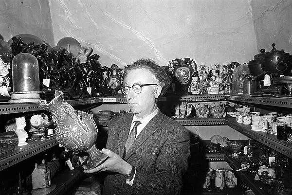 Bowes Museum Jan 1970 Director Frank Atkinson studies some of the antque items