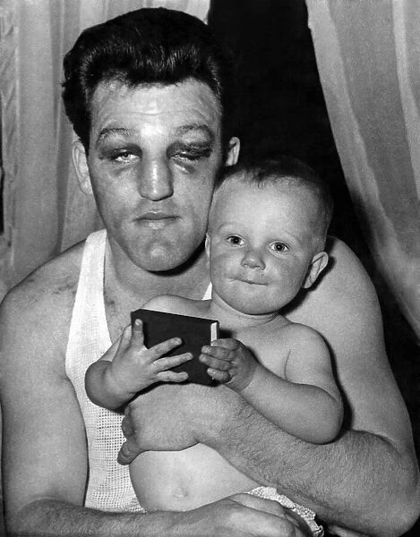 Boxer Brian London seen here with his son following his fight with Billy Hunter