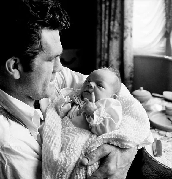 Boxer Freddie Mills and daughter Susan. July 1952 C3422-001