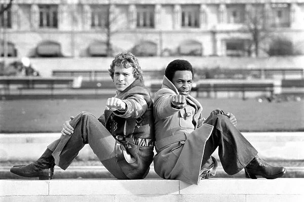 Boxer Hedgman Lewis with actor Ryan O Neill. January 1975 75-00255-001