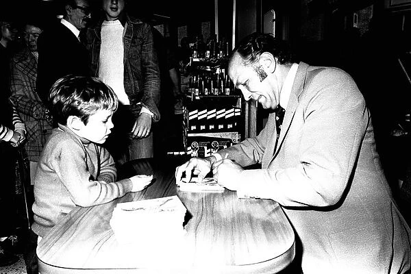Boxer Henry Cooper visited British Home Stores in Newcastle on 22nd October 1980 to sign