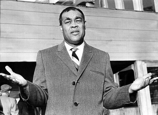 Boxer Joe Louis 1966 Former heavyweight champion of the world held up his hands