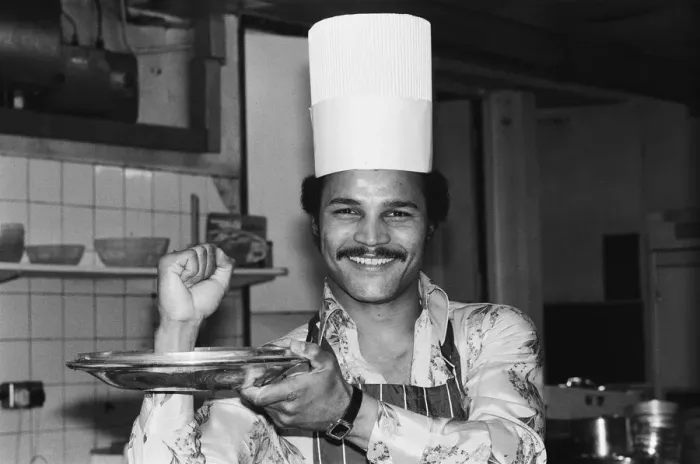 Framed Print : Boxer John Conteh with a chefs hat on. 28th September 1977 Framed Print : Boxer John Conteh with a chefs hat on. 28th September 1977