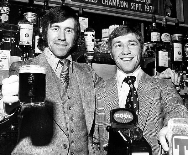Boxer Ken Buchanan behind bar with John Greig 1972