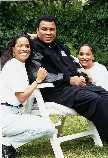 Boxer Muhammad Ali (Cassius Clay) with daughters. August 1992