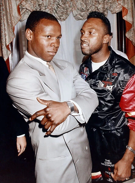 Boxers Chris Eubank (right) and Nigel Benn at the Cafe Royal in Piccadilly Circus ahead