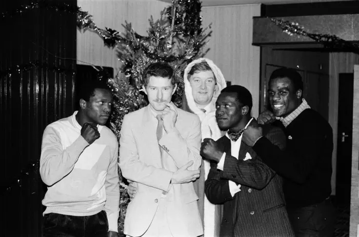 Framed Print : Boxers Terry Marsh and Errole Christie with promoter Frank Warren