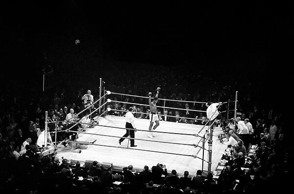 Boxing at Earls Court. Brian London v. Cassius Clay. Clay celebrates after knocking out