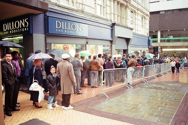 Boxing fans queue outside Dillions book store in Birmingham to see Muhammad Ali