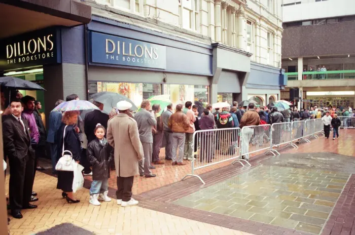 Framed Print : Boxing fans queue outside Dillions book store in Birmingham to see Muhammad Ali Framed Print : Boxing fans queue outside Dillions book store in Birmingham to see Muhammad Ali