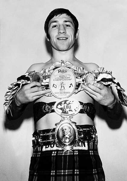 Boxing Ken Buchanan holding up the World Lightweight Championship belt