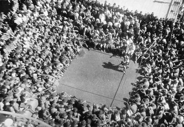 A boxing match on the Cunard White Star Liner Queen Mary now a troop ship