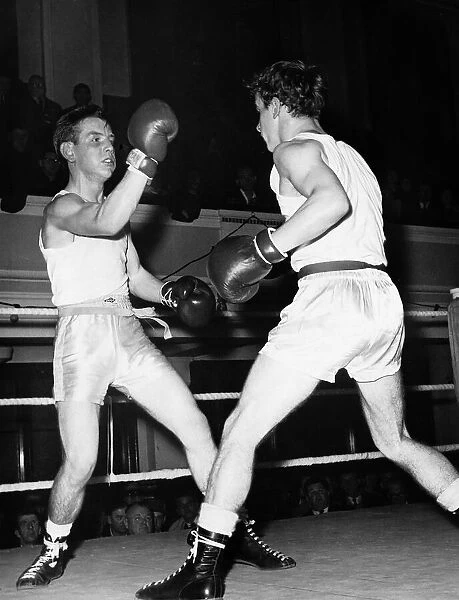 Boxing McCluskey throws a punch during a match with McAuley