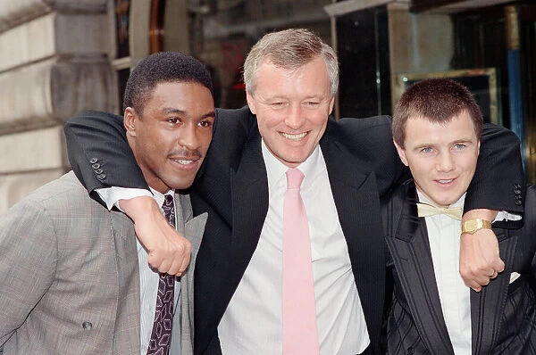 Boxing promoter Barry Hearn with his two boxers Michael Watson and Jim McDonnell