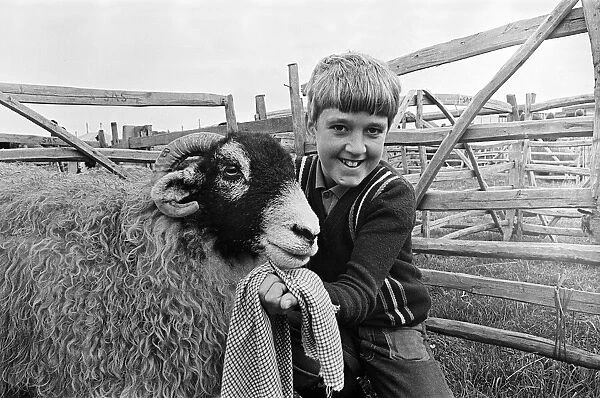 A boy at Stokesley show. Stokesley, North Yorkshire. 1973