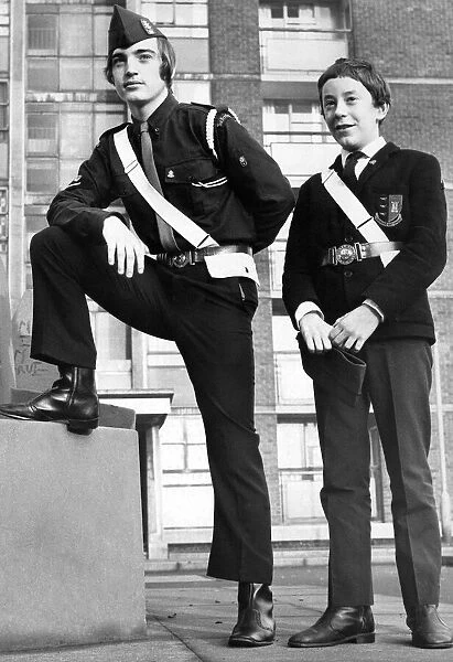 Two Boys Brigade members showing off the new uniforms