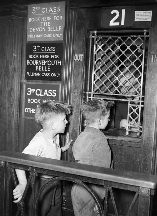 Framed Print : Two boys buying a ticket from the booking office at London Framed Print : Two boys buying a ticket from the booking office at London