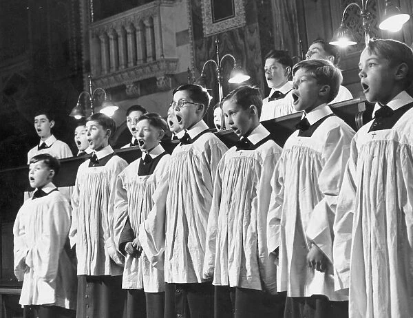 Boys of the choir School of Westminster sing a hymn during a service at Westminster