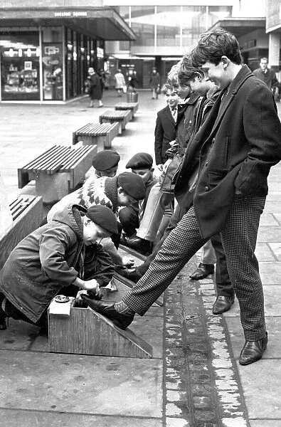 Boys from the Coventry (Whitmore Park) 41st scouts shoe-shining in Shelton Square