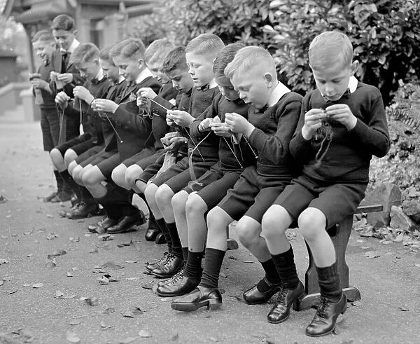 Boys at the Harris Orphanage in Preston seen here learning to knit. Circa 1950