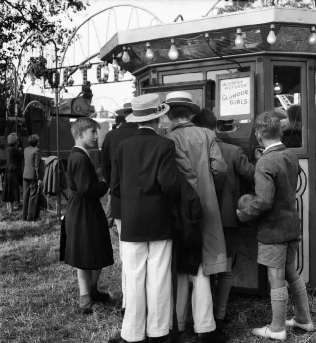 Framed Print : Boys at Henley queue to look at what the butler saw machine'. July 1953 D3393