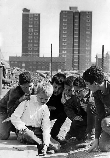 Boys playing outside in Butetown, Cardiff. 18th May 1967