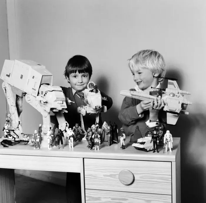 Framed Print : Two boys, Thomas (dark hair) and Robbin playing with their Star Wars toys Framed Print : Two boys, Thomas (dark hair) and Robbin playing with their Star Wars toys