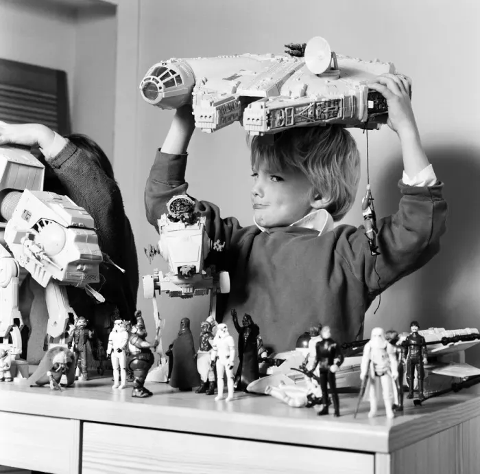 Framed Print : Two boys, Thomas (dark hair) and Robbin playing with their Star Wars toys