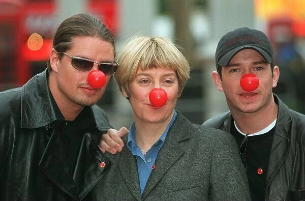 Boyzones Keith and Steve with Victoria Wood in London to day for the launch of comic