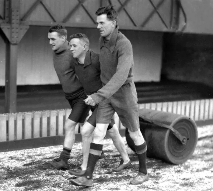 Framed Print : Bradford City FC. Cookson, Pringle and Clough pulling a roller in the snow Framed Print : Bradford City FC. Cookson, Pringle and Clough pulling a roller in the snow