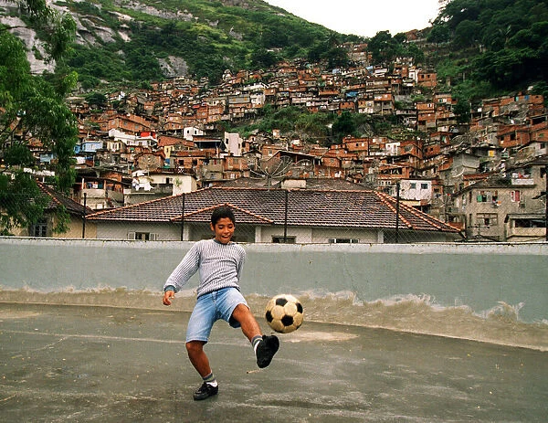Brazil World Cup feature in Rio De Janeiro. 12 year old Vitor Pedrosa from the Dona