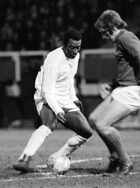 Brazilian football star Pele in action for Santos against Fulham March 1973