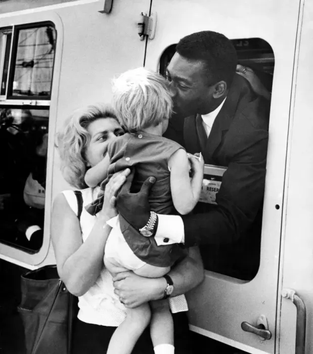 Framed Print : Brazilian football star Pele gives a parting kiss to three year old girl Virginia Ferrari Framed Print : Brazilian football star Pele gives a parting kiss to three year old girl Virginia Ferrari